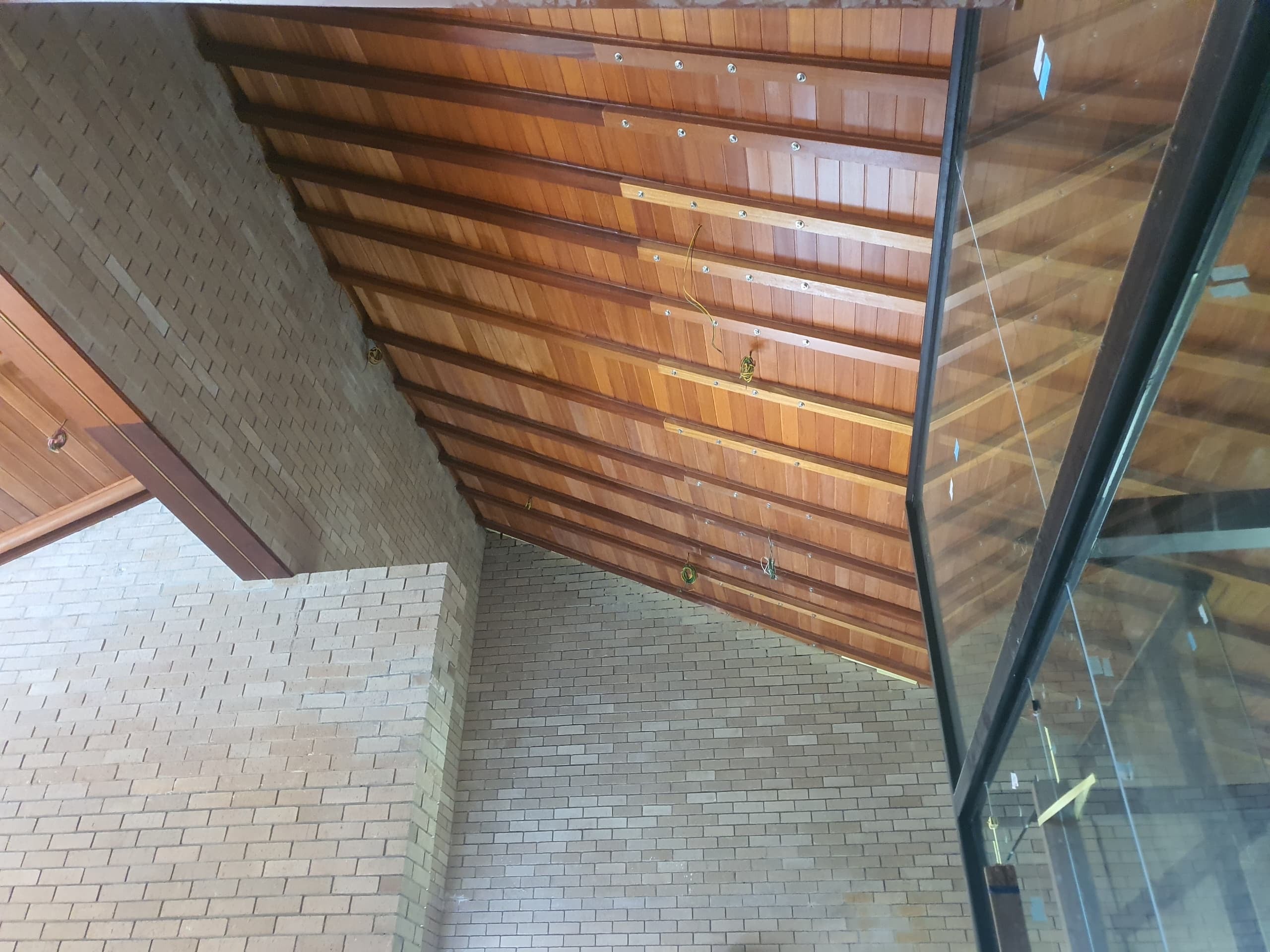 Solid hardwood ceiling installed smooth sanding and clear varnish finished.