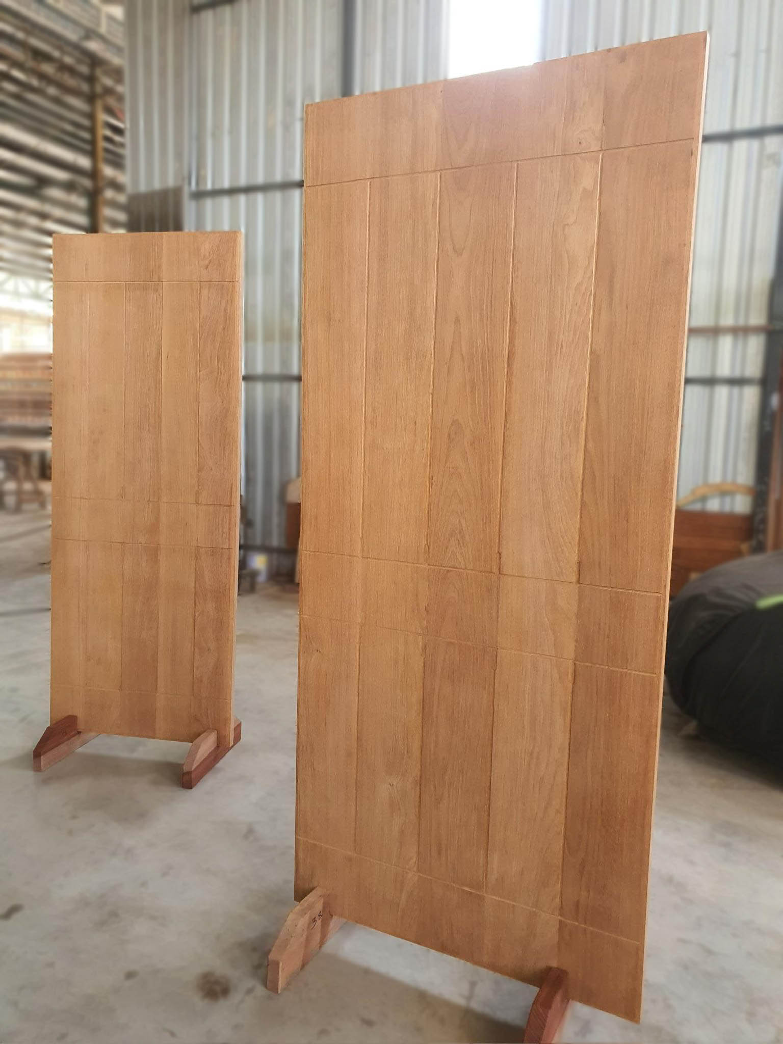 2 pieces of full solid merbau wood door with customised lines designs with smooth sanding finished.