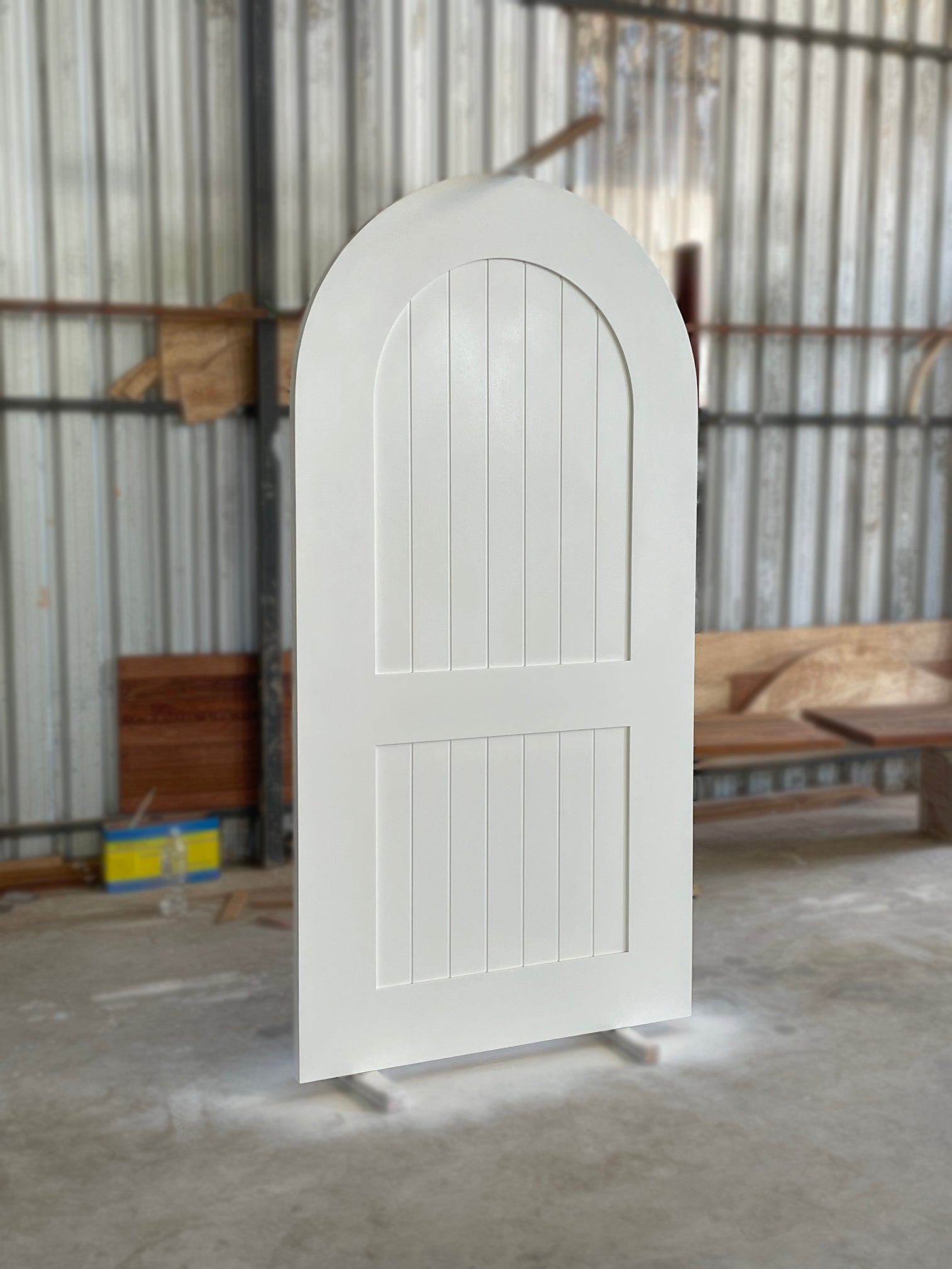 White paint finished wooden door with arch top made from full solid nyatoh hardwood.